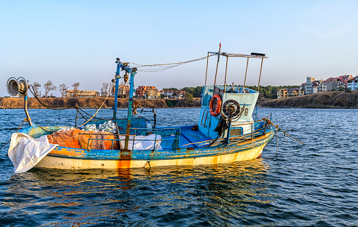 A fishing boat in the Black Sea on a sunny day in Ahtopol, Bulgaria
