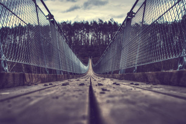 Suspension rope bridge in Hohe Schrecke, Germany.