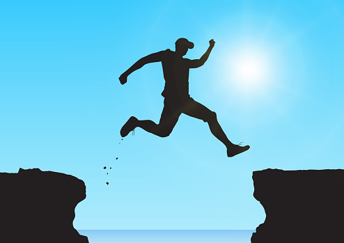 Silhouette of man jumping  over the cliffs, success and winning   concept vector illustration