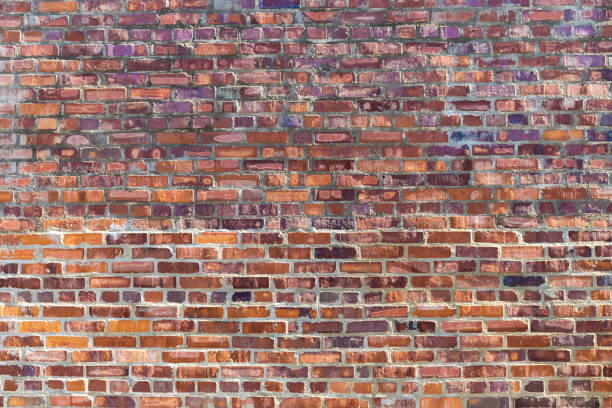 istock Closeup shot of old grunge dark red brick texture details with pattern background. 1462987631
