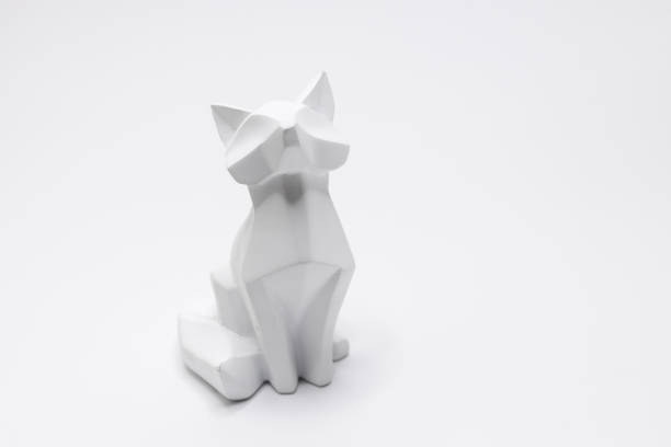 istock Cat figurine in origami style with a white background 1462988597