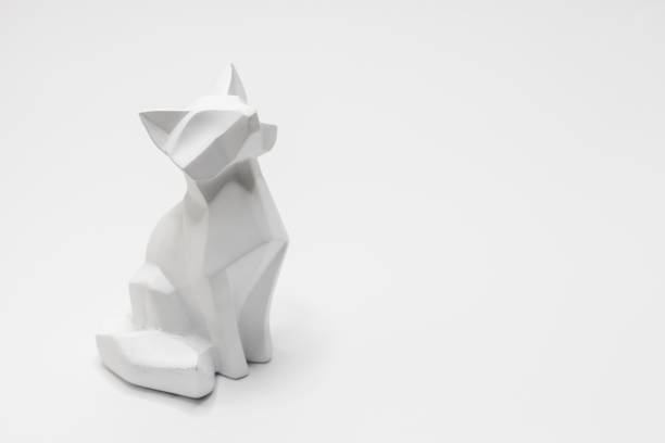 istock Cat figurine in origami style with a white background 1462988599