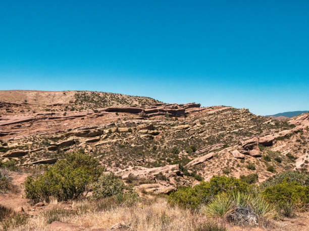 istock Beautiful summer landscape with the rocks against the blue sky. 1462993270