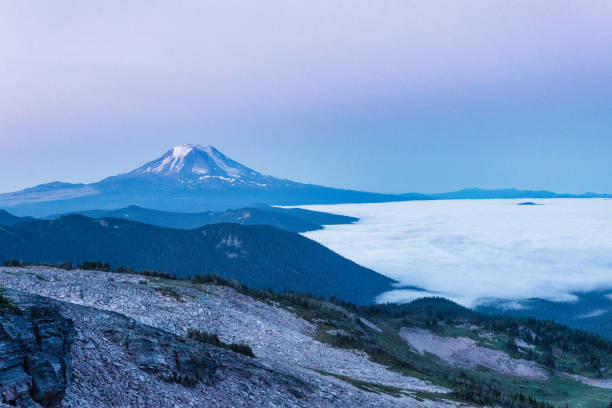 istock Mesmerizing view of mountains above clouds 1462993289