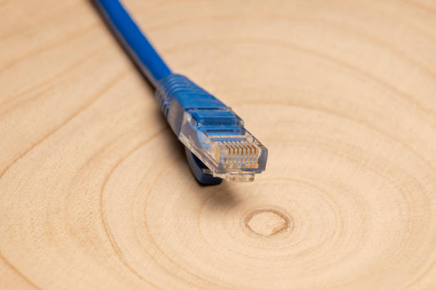 WIFI Router with network cable plugged in - on white Background