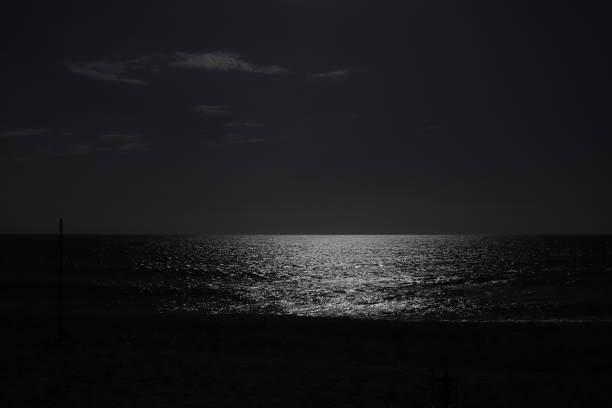 istock A reflection of the sun on the ocean 1463006676