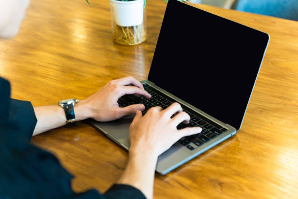 istock image of young asian hand typing 1463007910