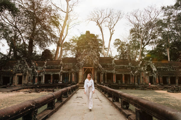 istock Traveler Exploring Ancient Ruins of Ta Prohm Temple at Angkor 1463022906