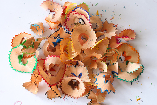 Pencil shavings on a white paper.