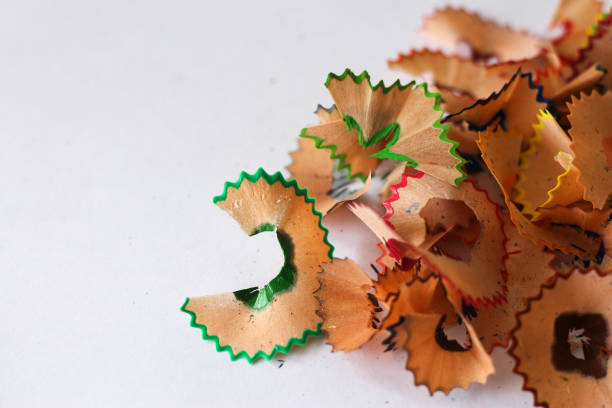 istock Pencil shavings on a white paper. 1463044878