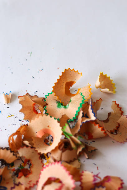 istock Pencil shavings on a white paper. 1463045003