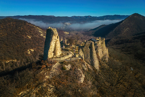 Medieval fortress ruins and forest in Samobor, Croatia, view from drone in autumn