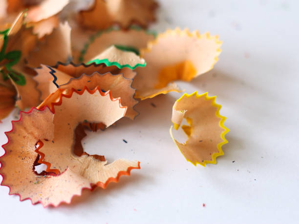 istock Pencil shavings on a white paper. 1463045278