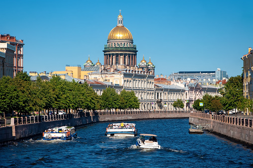 St. Petersburg, Russia - August 23 , 2022: Saint Isaac's Cathedral view from the Moika River. High quality photo