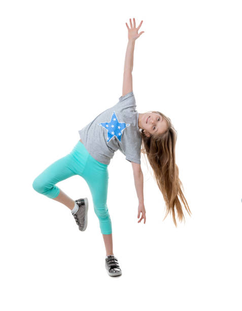 istock Carefree long-haired girl dancing, isolated 1463050857