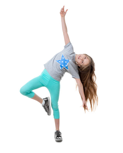 istock Carefree long-haired girl dancing, isolated 1463050864