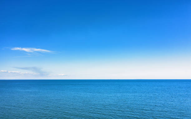 istock Horizon line, blue sky and blue sea. Drone view 1463054084