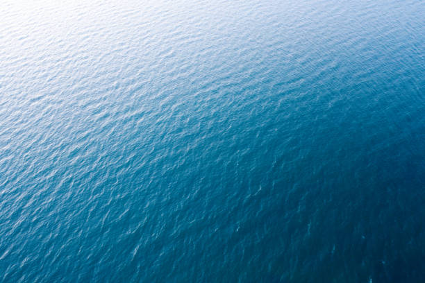 istock Blue sea water texture calm and peaceful background 1463054107
