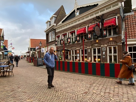 Volendam, Netherlands - January 06, 2023. Street view of the historical city Volendam on a cold day in January