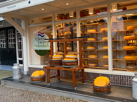 Volendam, Netherlands - January 06, 2023. View of the historical cheese factory  in Volendam city on a cold day in January