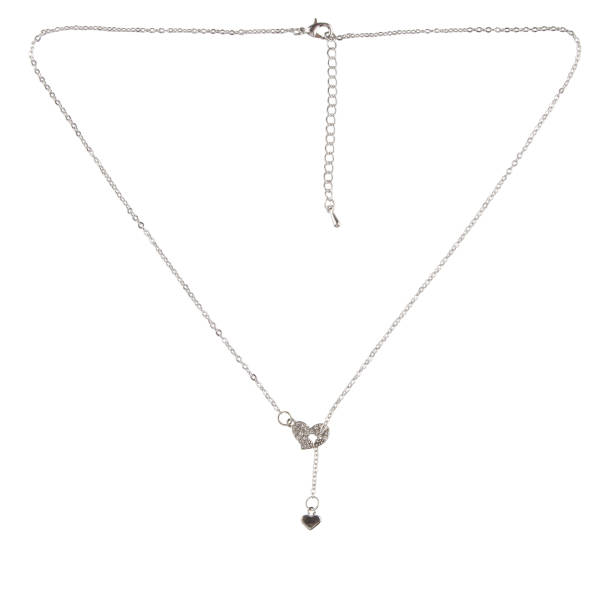 istock Silver pendant with a diamond on a thin chain on a white background 1463058050