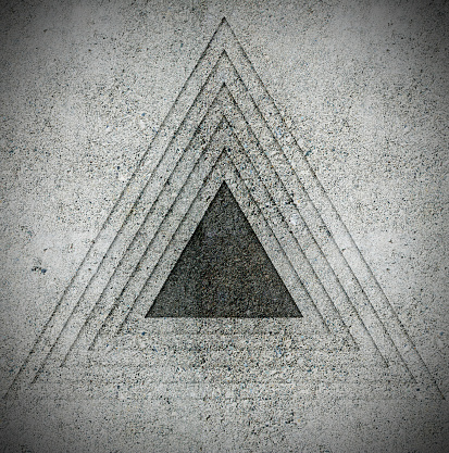 Abstract triangles pattern in concrete