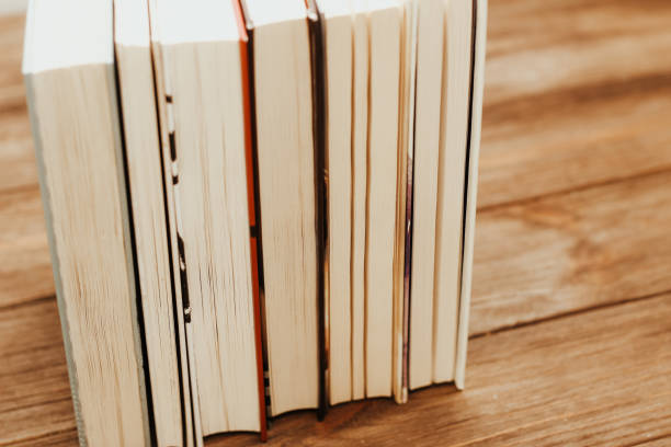 istock A stack of books stand on the tables, stacked in the frame 1463059004