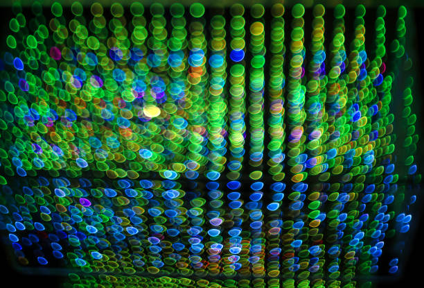 istock Multicolored Christmas bokeh on a black background. Abstract background. 1463063384