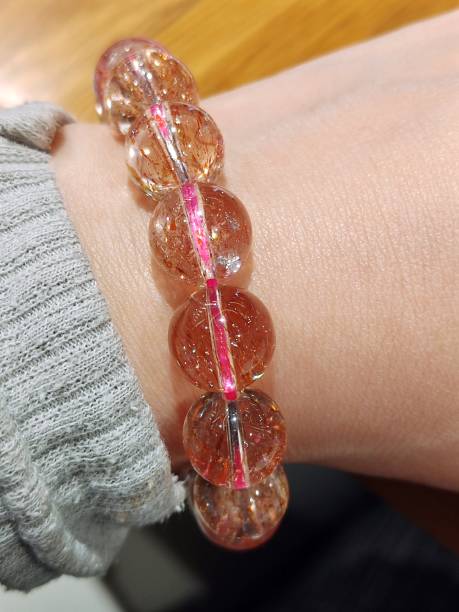 istock Golden strawberry crystal bracelet 1463064299