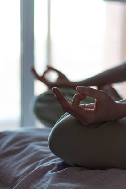 istock Woman practicing yoga at home 1463066065