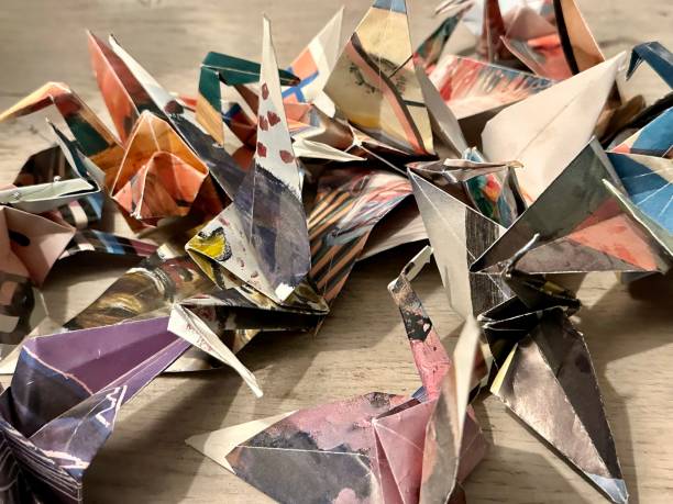 istock Origami birds in different colors and sizes 1463067680
