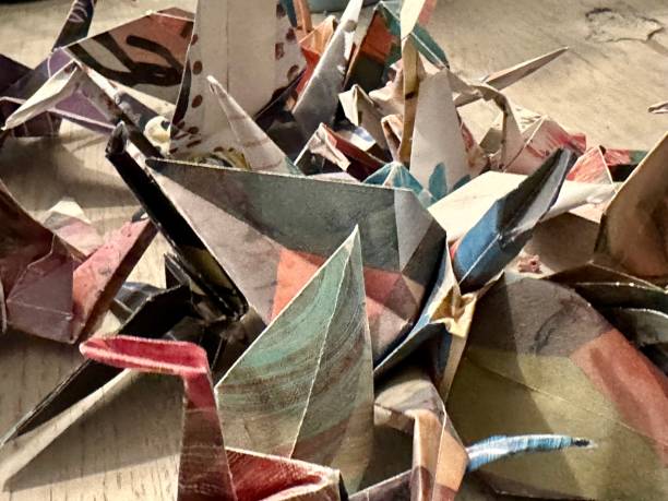 istock Origami birds in different colors and sizes 1463067710