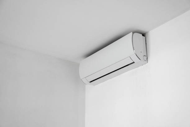 istock Air conditioning in the top corner of a room 1463067721