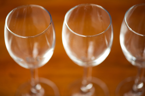 Scotch whiskey glass and old wooden barrel. With copy space