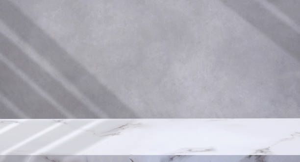 istock Empty White Marble counter with Shadow on surface of Concrete Wall background in loft style, Suitable for Product Display Presentation 1463077573
