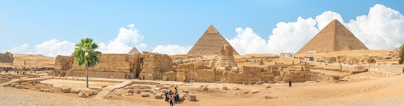 Woman standing near the Giza pyramids