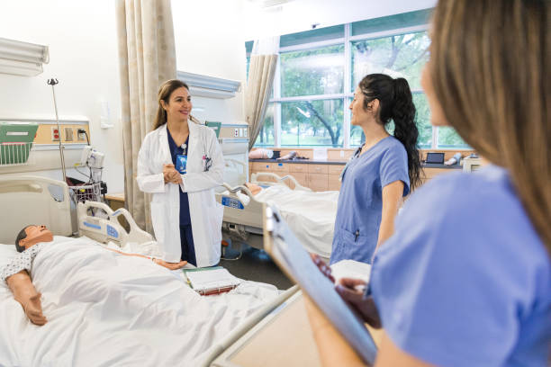 istock Hospital instructor smiles while listening to the trainee's answer 1463083723