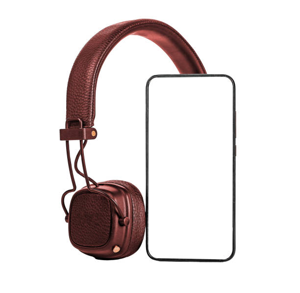istock Phone screen mock-up and wireless headphones for mobile app, audio application promotion isolated on white background 1463085736
