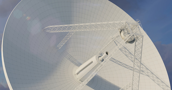 White satellite dish in a sunlight in close-up