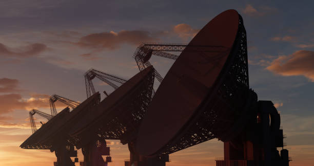 istock Radio telescopes in a row against the clouded sky after sunset from the side 1463088282