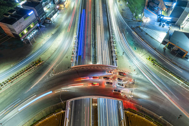 istock Expressway top view, Road traffic an important infrastructure, Drone aerial view fly in circle, traffic transportation, Public transport or commuter city life concept of economic and energ, transport. 1463088671