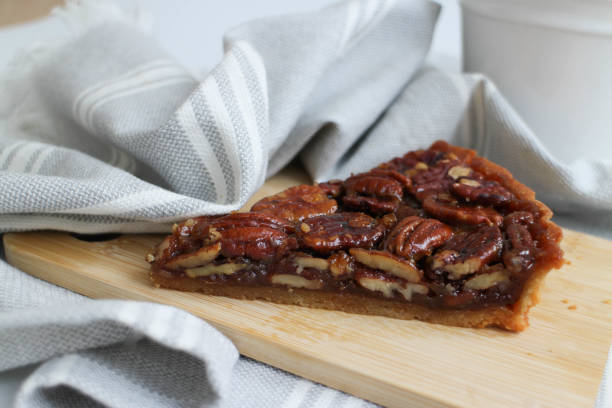 istock Close up a slice of Classic Caramel Pecan Pie 1463090956