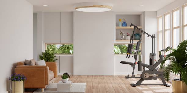 istock Living room have orange leather sofa and exercise equipment on white wall. 1463091288