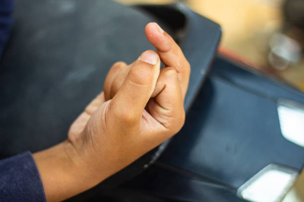 istock It has a human hand and a car on it and the background is blurred 1463092992