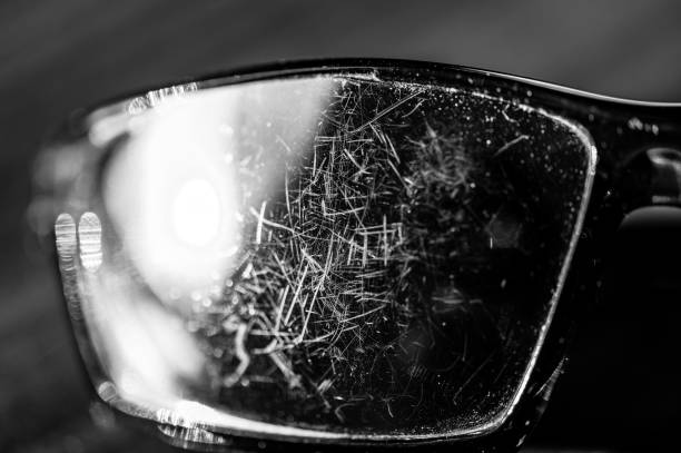 macro of the scratched surface of a polarized sunglasses lens