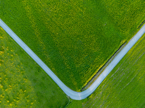 Aerial view of a sharp turn of a country road
