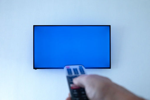 Changing channels on a multimedia TV