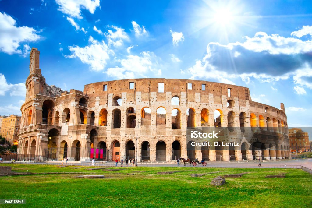 Back of Colosseum A full wide angle view of the rear of the Roman Colosseum on a bright sunny day. Amphitheater Stock Photo
