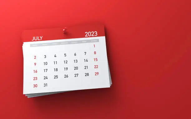 2023 July month calendar on red background stock photo