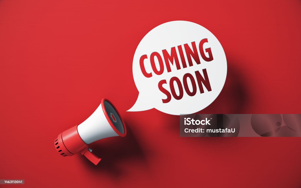 Coming Soon Written Speech Bubble and Red Megaphone on Red Background stock photo Coming Soon Sign Stock Photo